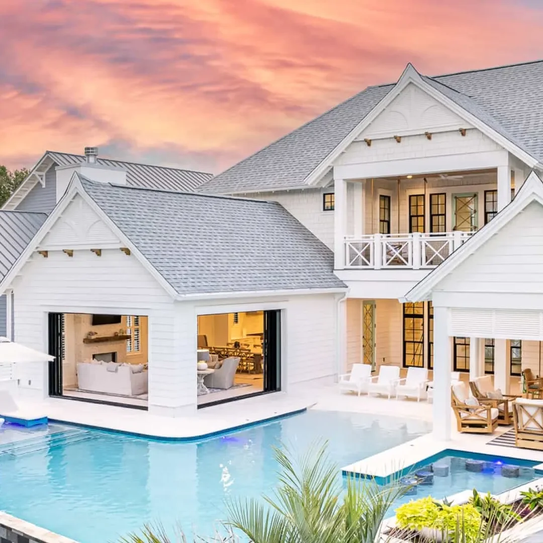 Welcoming vacation home with a private pool at sunset